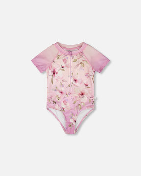 Front flat lay of Deux par Deux girl one-piece swimsuit in purple flower print