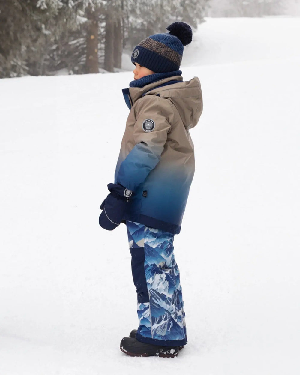 Side view showing articulated knees, kids winter suit.