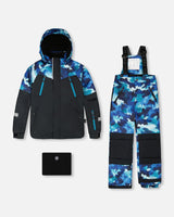 Flat lay — teal/blue camo jacket + black pants jacket and snow pants, ships fast - buy now.