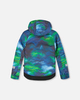 Back view of jacket and snow pants with suspenders, black pants