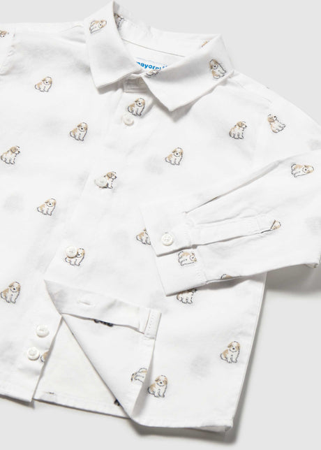 Close-up of the collar, buttons and small dog print on the white shirt