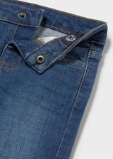 Close-up of Mayoral baby boy jeans showing Dark Blue denim wash, waistband, and button detail.