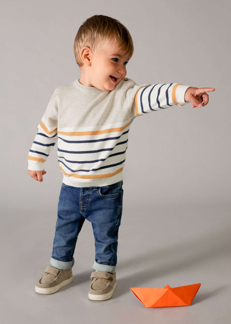 Mayoral baby boy slim fit jeans styled with striped top for a casual toddler outfit.