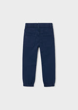 Back of the navy jogger pants with two back pockets and elastic cuffs