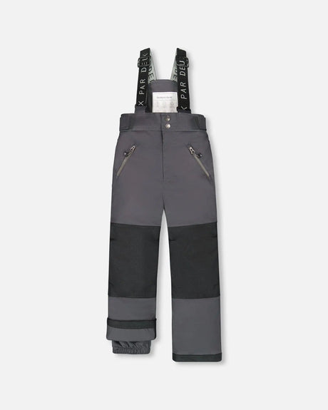Flat lay of Deux Par Deux kids snow pants dark gray with suspenders