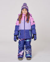 Lifestyle photo of child in Deux par Deux purple mountain snowsuit – order kids’ winter gear