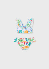 Mayoral girls ruffled bikini set showing printed top and matching swim bottoms.