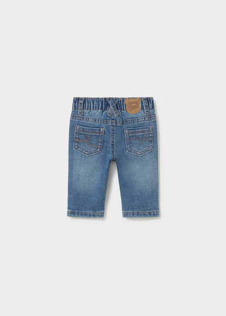 Front view of Mayoral baby boy blue jeans with classic denim wash and infant sizing.