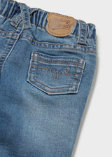 Close-up of Mayoral baby boy jeans showing back pocket, waistband, and blue denim detail.