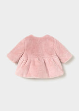 Back of the pink faux fur coat with gathered flared hem