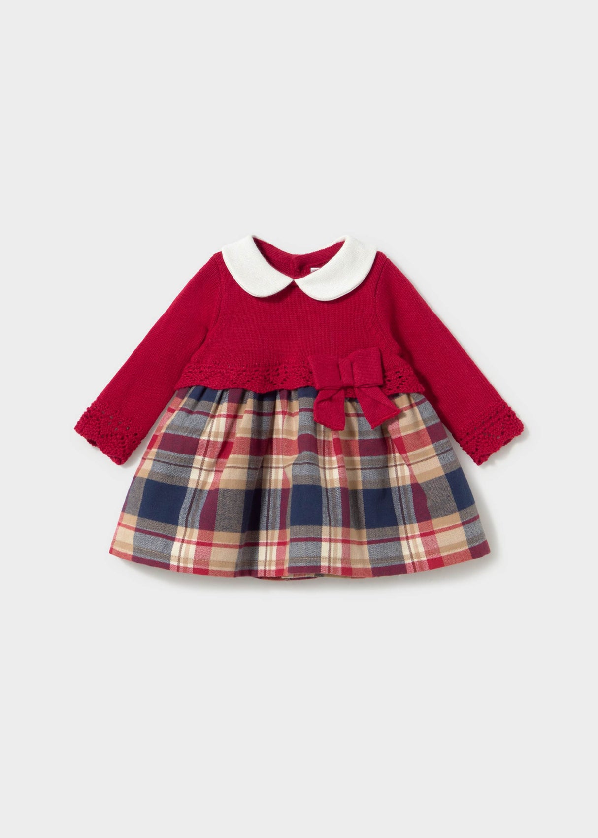 Mayoral newborn baby girl knit dress with red bodice, white collar, plaid skirt, and bow detail.