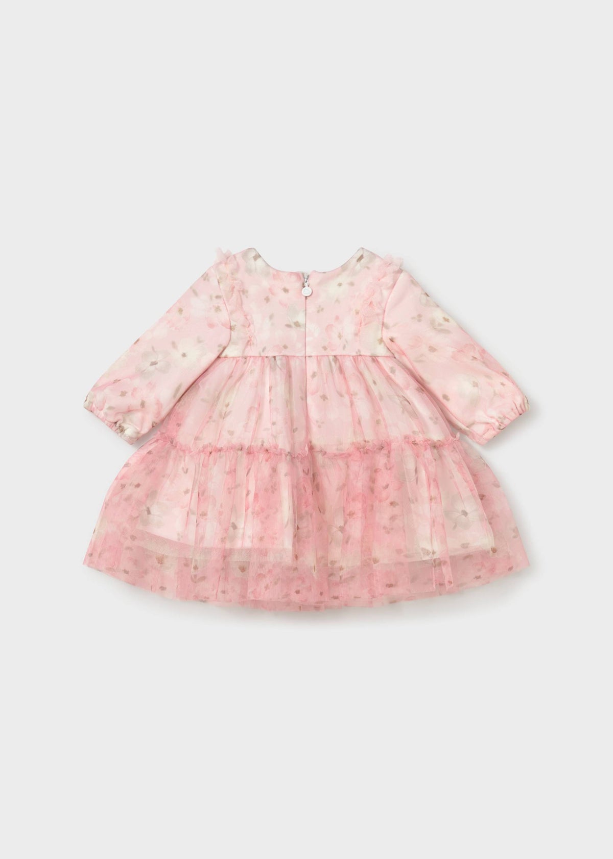 Back of the pink floral tulle dress showing the long sleeves, tiered skirt and zip closure